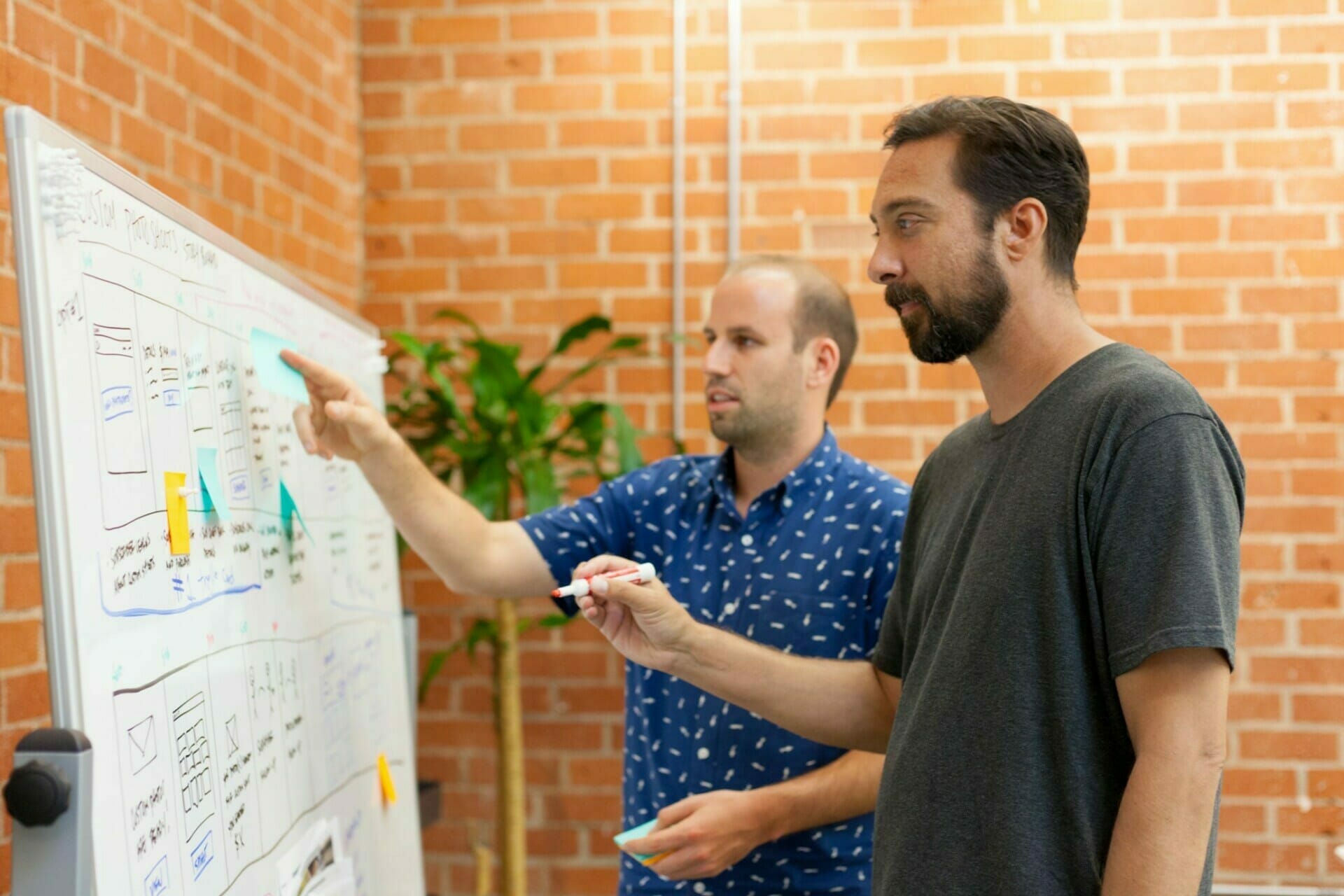 Young-professional-millennial-business-man-working-at-startup