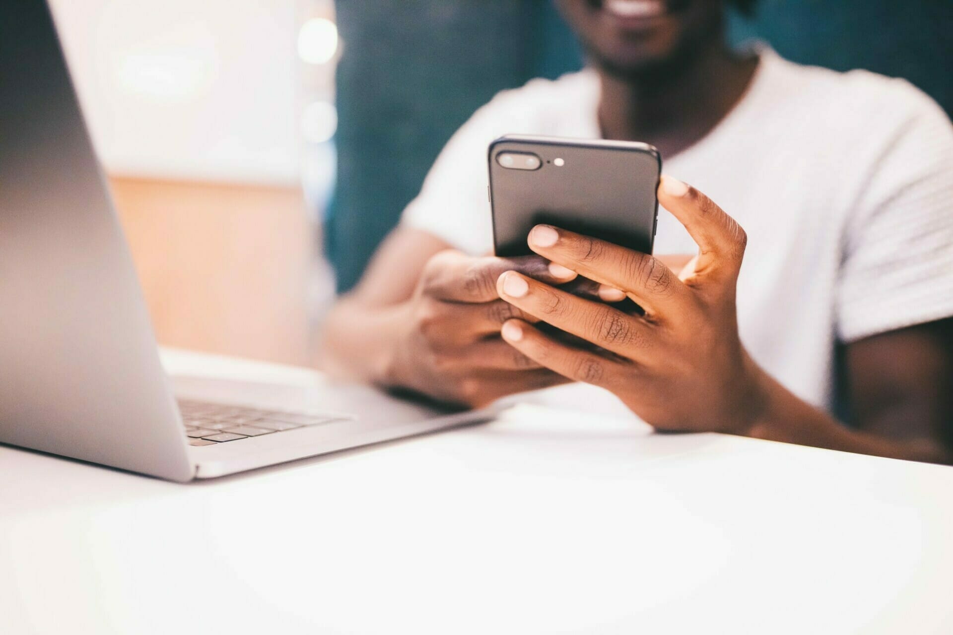 business-technology-office-reading-man-smart-phone-typing-social-media-african-american-messaging_t20_6wQPkN